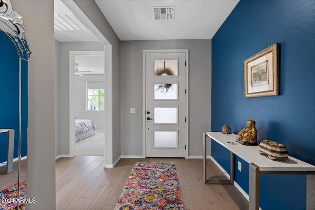 foyer with light wood-type flooring