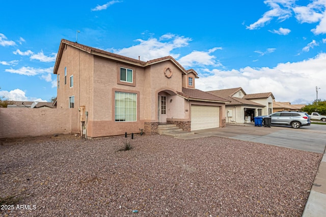 view of front of home with a garage