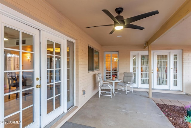 view of patio featuring french doors and ceiling fan