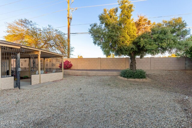 view of yard with a fenced backyard