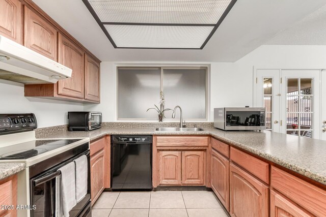 kitchen with stainless steel microwave, range with electric cooktop, under cabinet range hood, dishwasher, and a sink