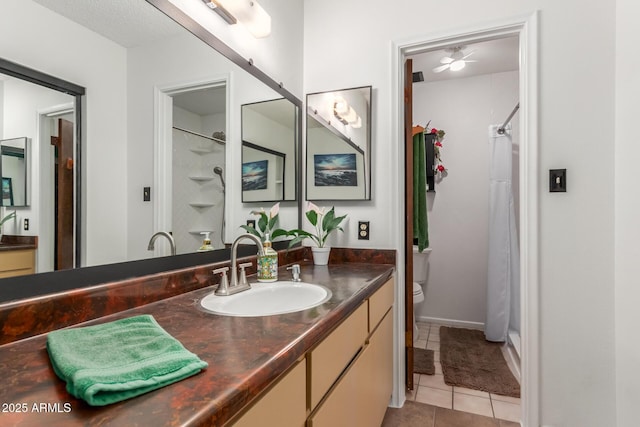 full bath featuring tile patterned flooring, curtained shower, vanity, and toilet