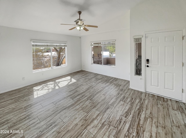 entrance foyer featuring light hardwood / wood-style flooring and ceiling fan