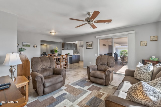 living room with a ceiling fan