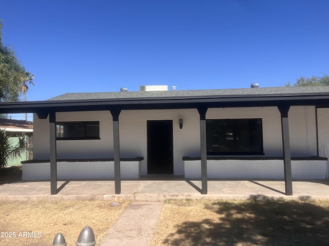 view of front of home with a patio