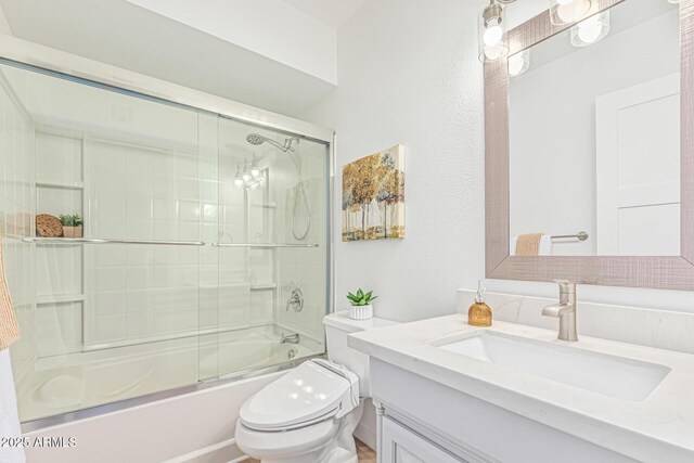5333 E Sheena Dr, Scottsdale, AZ 85254 - full bath featuring vanity, toilet, and shower / bath combination with glass door