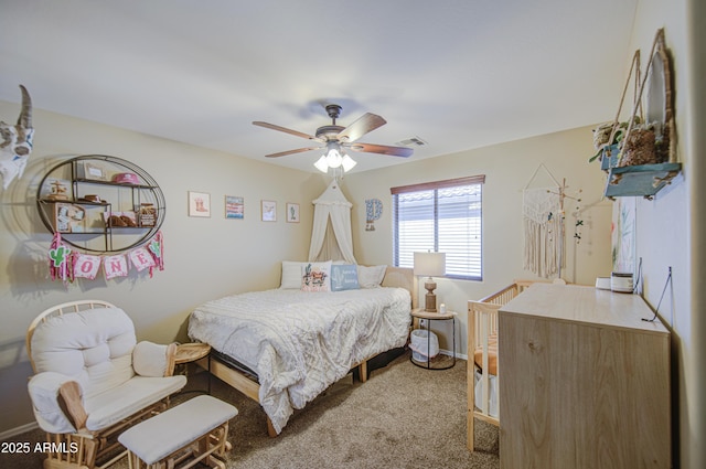 bedroom with carpet, visible vents, baseboards, and ceiling fan