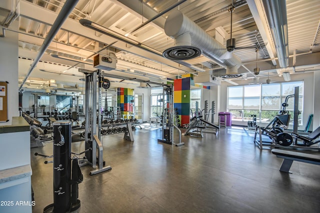 exercise room with visible vents and a wealth of natural light