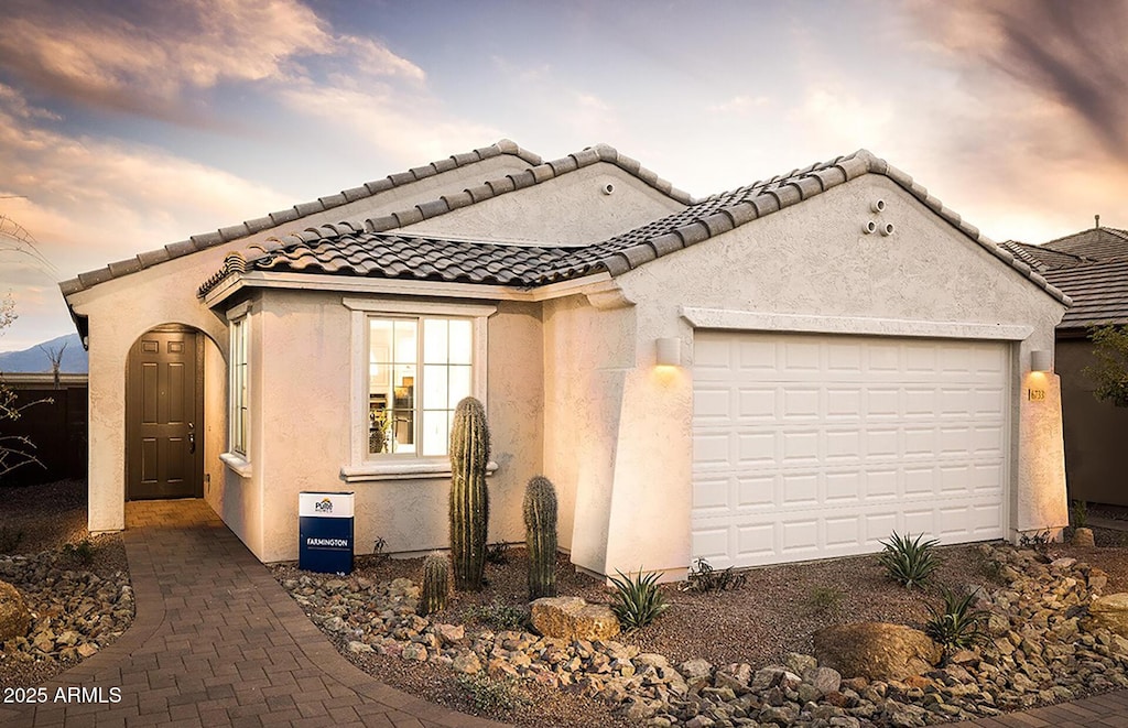 view of front of home featuring a garage