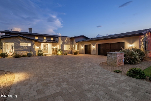 view of front of home with a garage