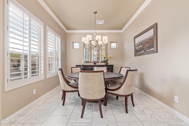 30056 N 129th Ave, Peoria, AZ 85383 - dining space featuring ornamental molding and an inviting chandelier