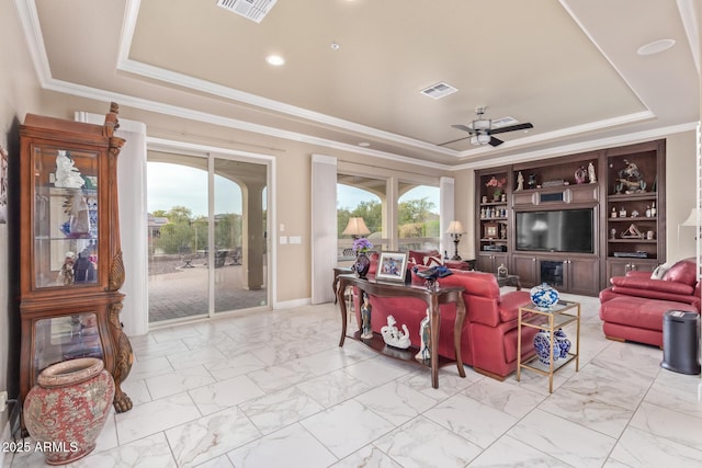 30056 N 129th Ave, Peoria, AZ 85383 - living room featuring ceiling fan, crown molding, a raised ceiling, and a healthy amount of sunlight