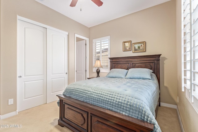 30056 N 129th Ave, Peoria, AZ 85383 - bedroom with light carpet, ceiling fan, and a closet