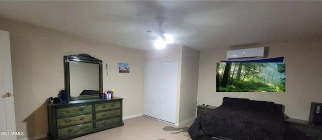 bedroom with an AC wall unit