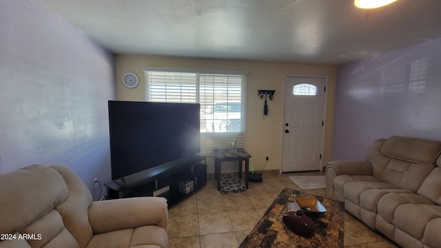 living room featuring light tile patterned flooring