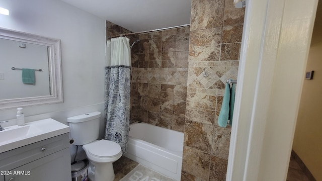 full bathroom featuring vanity, toilet, and shower / bathtub combination with curtain