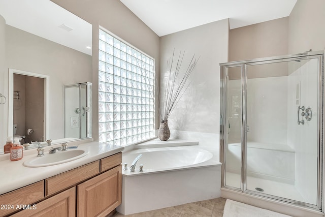 full bathroom with toilet, vanity, tile patterned flooring, and shower with separate bathtub