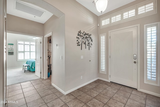 view of tiled foyer entrance