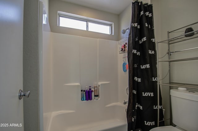 bathroom with toilet and shower / bath combination with curtain