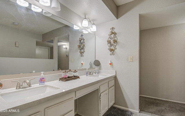 bathroom with vanity and tile patterned floors