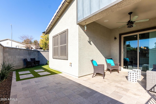 view of patio / terrace with ceiling fan