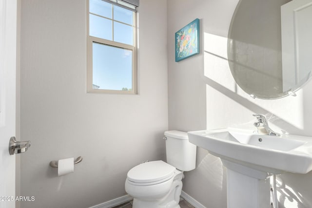 bathroom with sink and toilet