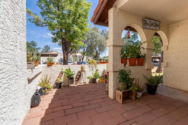 view of patio featuring fence