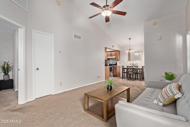 living room featuring light carpet, high vaulted ceiling, ceiling fan with notable chandelier, baseboards, and visible vents