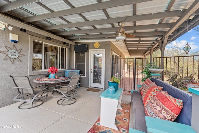 view of patio featuring a pergola and ceiling fan