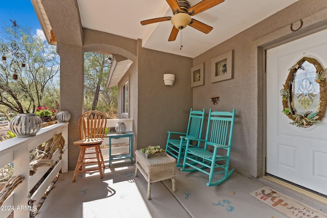 view of patio featuring ceiling fan