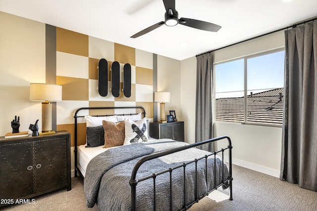 bedroom with light carpet, ceiling fan, and baseboards