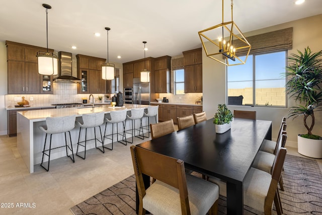 dining room featuring recessed lighting and an inviting chandelier