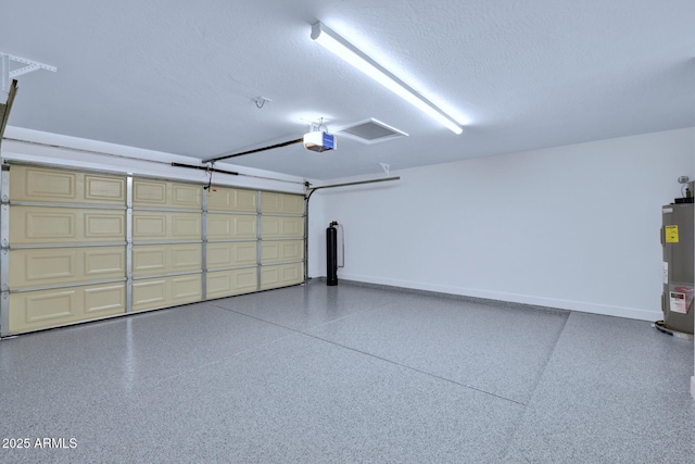 garage featuring a garage door opener and water heater