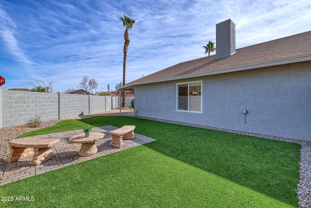 view of yard featuring a patio