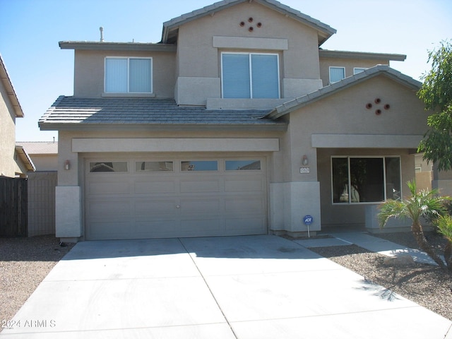 view of front of property featuring a garage