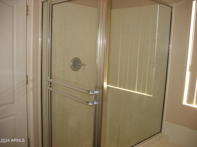 bathroom with walk in shower