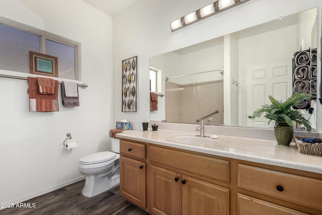 11312 E Newcastle Ave, Mesa, AZ 85209 - full bath featuring vanity, wood finished floors, and a shower