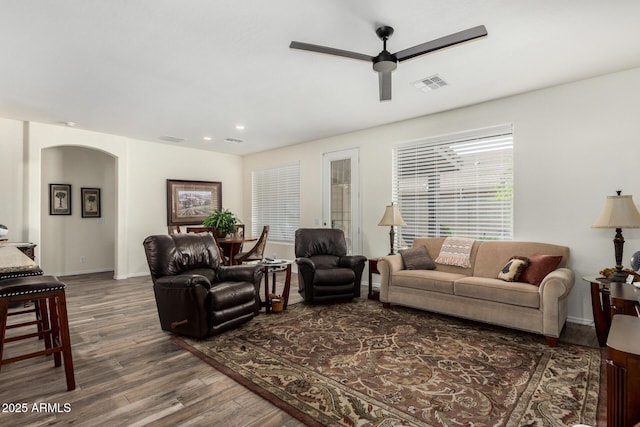 11312 E Newcastle Ave, Mesa, AZ 85209 - living area with arched walkways, a ceiling fan, wood finished floors, and recessed lighting