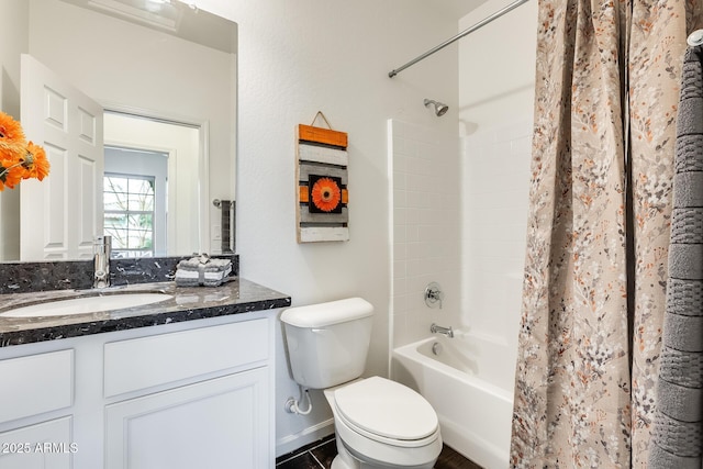 full bathroom featuring vanity, toilet, and shower / bath combo