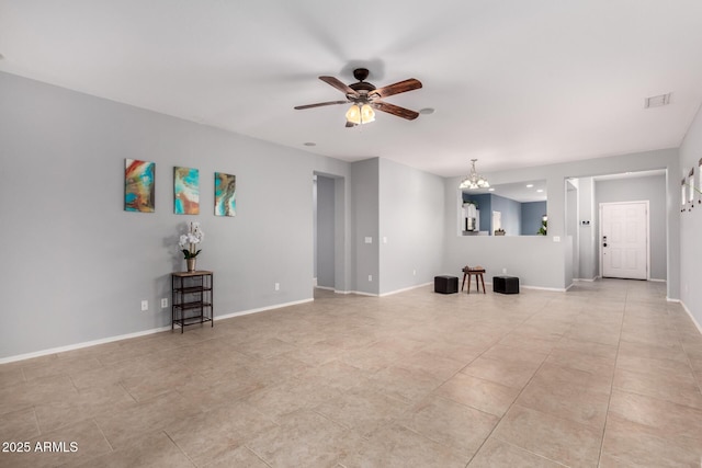 unfurnished living room featuring visible vents, light tile patterned flooring, ceiling fan with notable chandelier, and baseboards