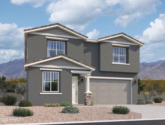 traditional home featuring a garage, a mountain view, and stucco siding