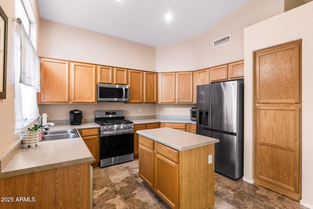 300 W Cardinal Way, Chandler, AZ 85286 - kitchen with appliances with stainless steel finishes, a sink, light countertops, a center island, and a high ceiling