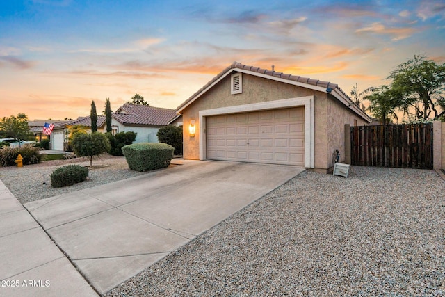 300 W Cardinal Way, Chandler, AZ 85286 - ranch-style home with stucco siding, driveway, an attached garage, and a tiled roof