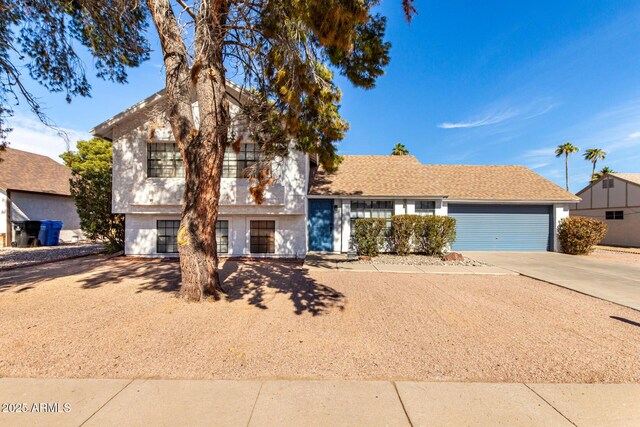 split level home with a garage