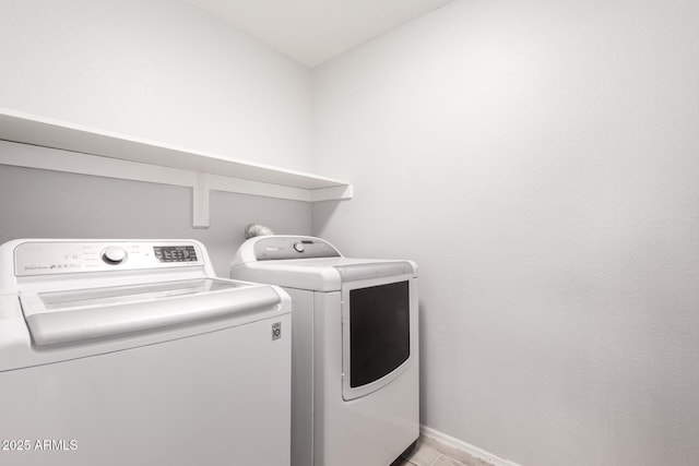 washroom featuring separate washer and dryer