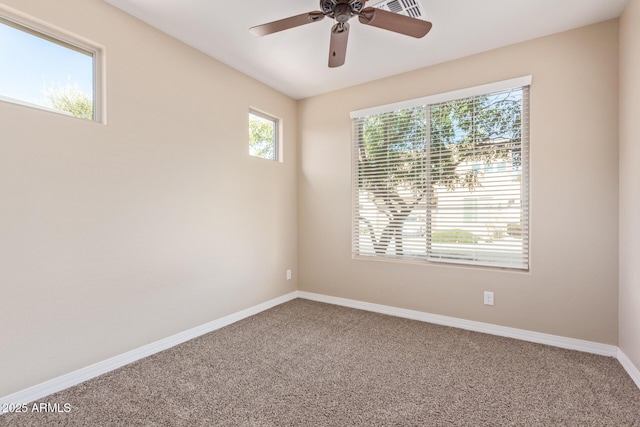 carpeted empty room with ceiling fan