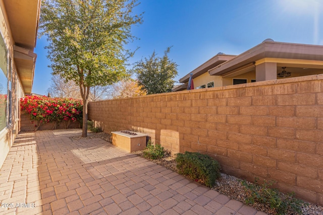 view of patio / terrace featuring a fire pit