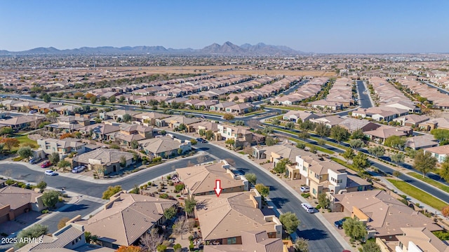 birds eye view of property featuring a mountain view