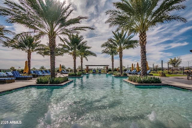 view of swimming pool featuring a patio area