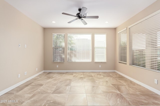 empty room featuring ceiling fan